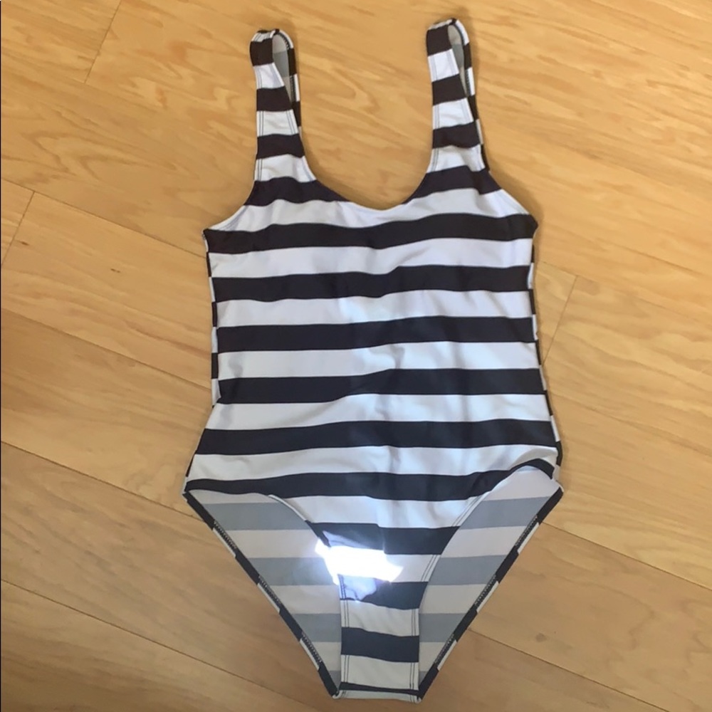 Navy blue and white one piece bathing suit